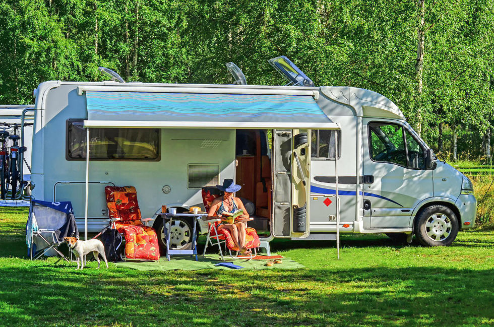 Person relaxing with RV insurance